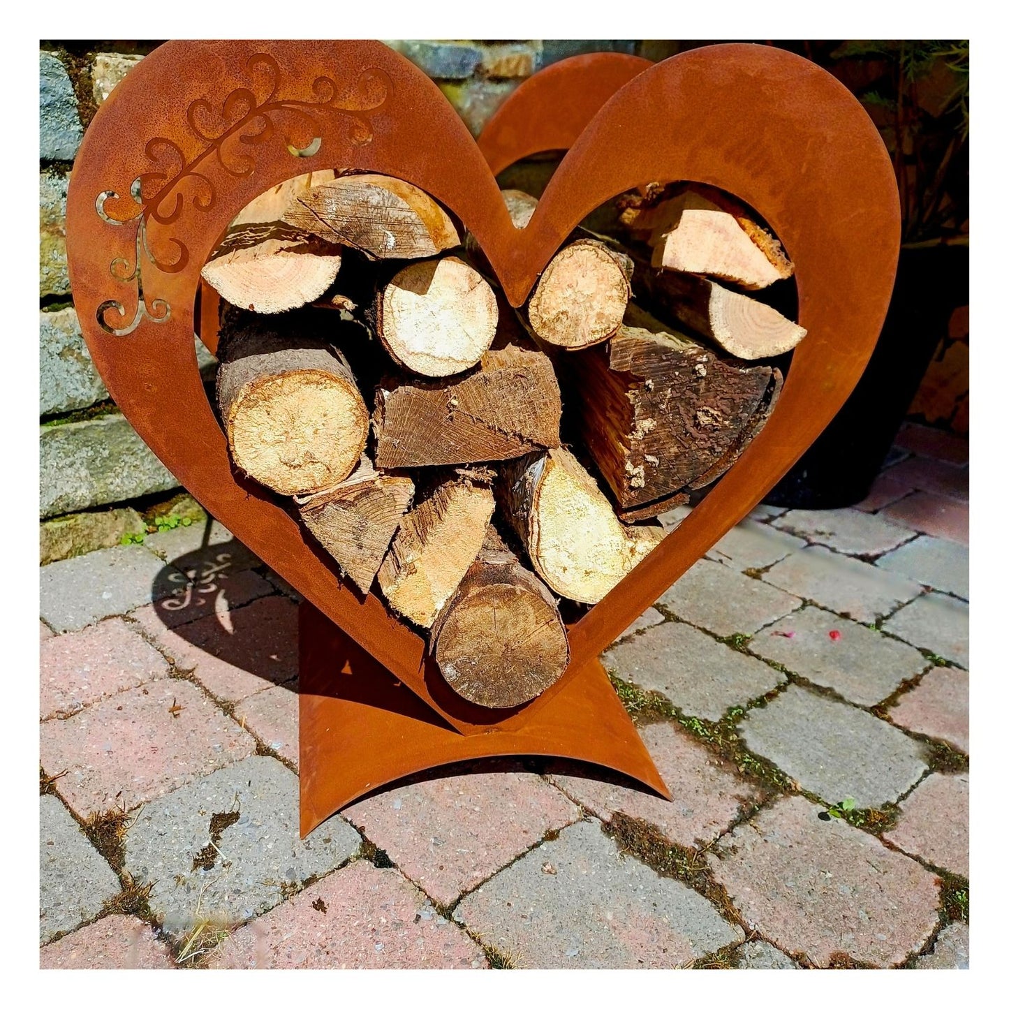 Support à bois en forme de coeur