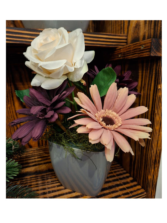 Montage unique – Fleurs pourpres et vieux rose en pot lesté