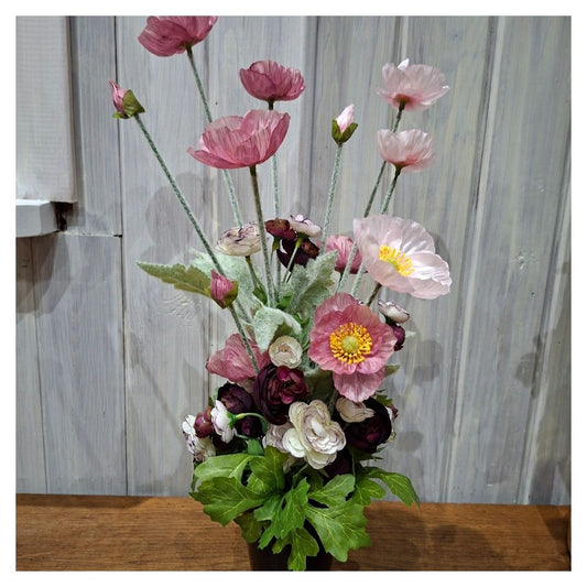 Montage unique Toussaint – Fleurs roses et violine en pot lesté